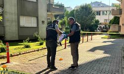 Emekli polis apartman görevlisini silahla yaraladı