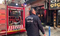 Efeler'de vatandaşların dikkati iş yerini yanmaktan kurtardı