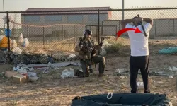 Elinde sopayla ABD askerine diz çöktürdü