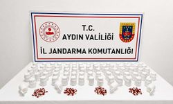 Efeler'de binlerce yasaklı hap ele geçirildi
