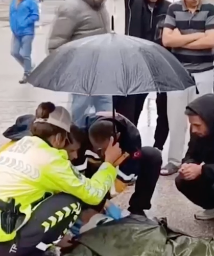 İçişleri Bakanı Çiftçi’den, yaralı gence şemsiye tutan trafik polisine teşekkür