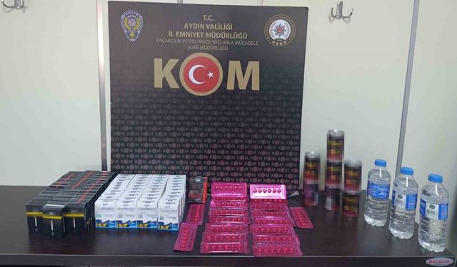 Efeler'de kaçak cinsel içerikli ürün ve yüzlerce makaron ele geçirildi