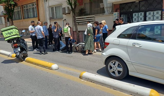 Efeler'de karşı şeride geçen otomobil ile motosiklet çarpıştı: 1 yaralı
